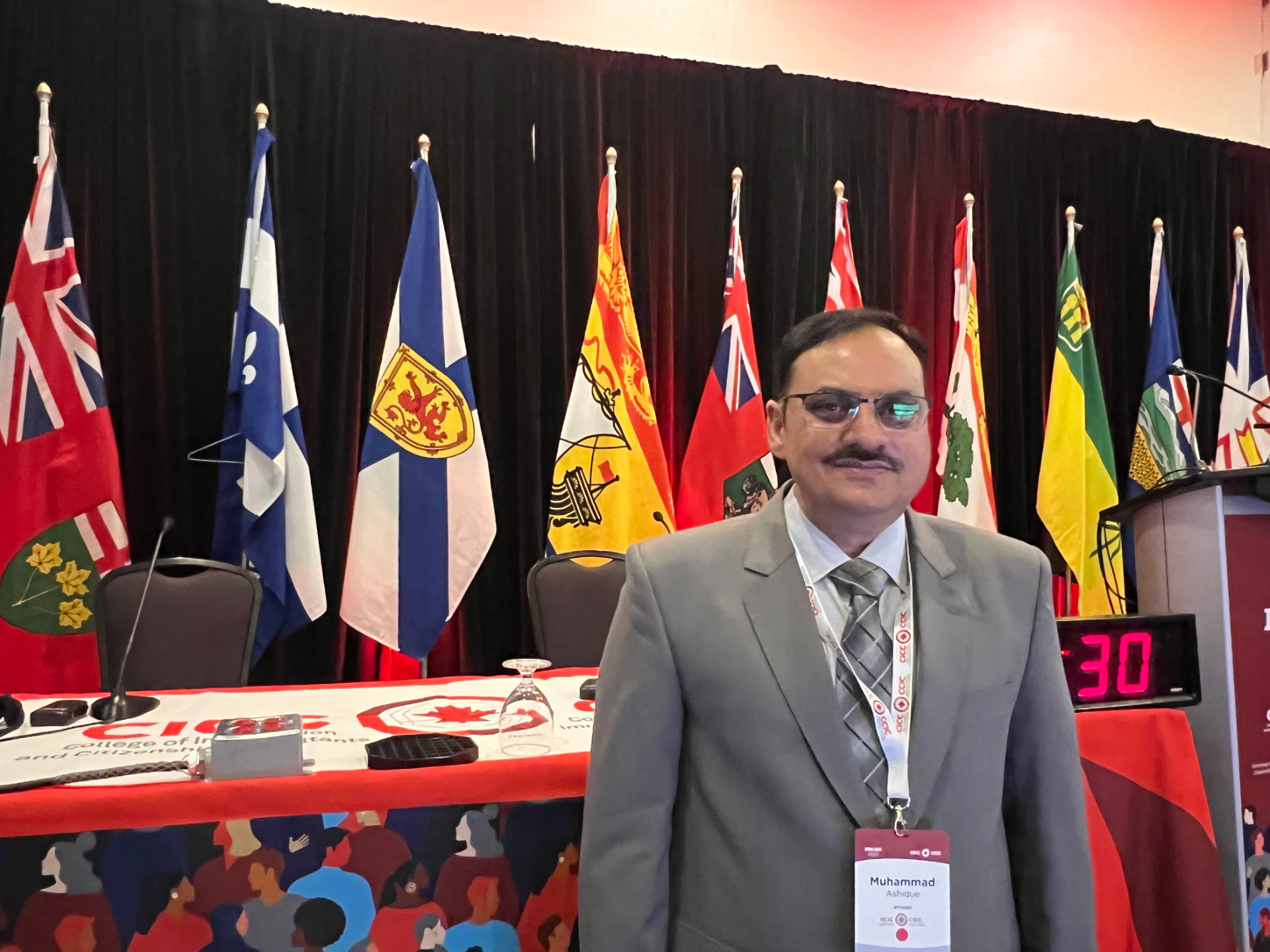 Icefield Immigration consultant at a College of Immigration and Citizenship Consultants event